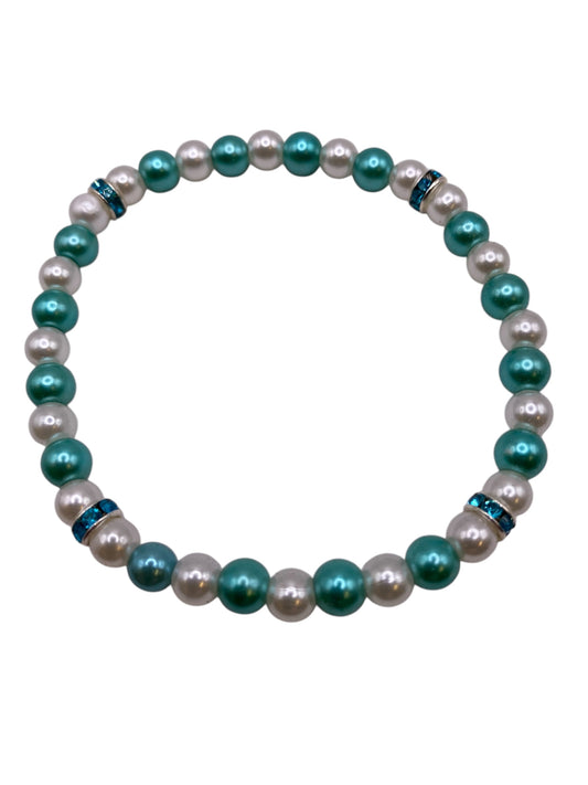 Pärlarmband med vita och turkosa vaxade glaspärlor