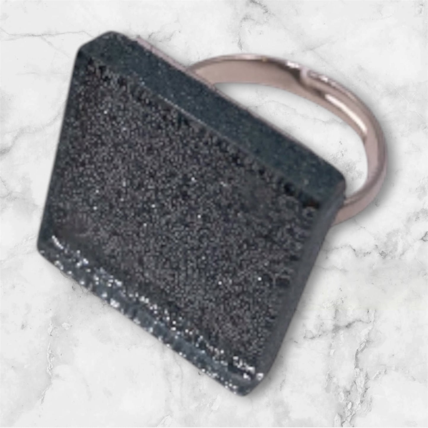 Silverskimrande mosaik ring